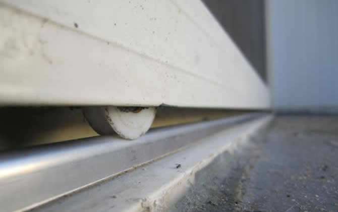 Sliding door rollers